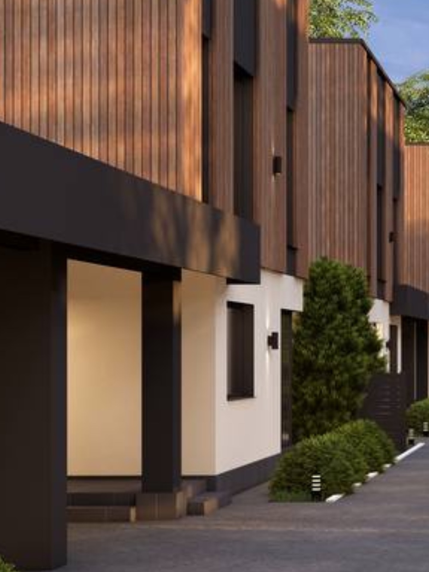 Ряд котеджів комплексу Villas Garden у вечірньому світлі